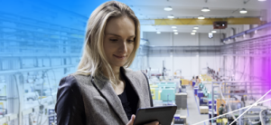 woman is controlling assembly line in the factory using her tablet
