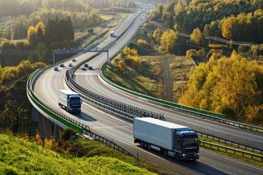 motorway with trucks seen from a distance